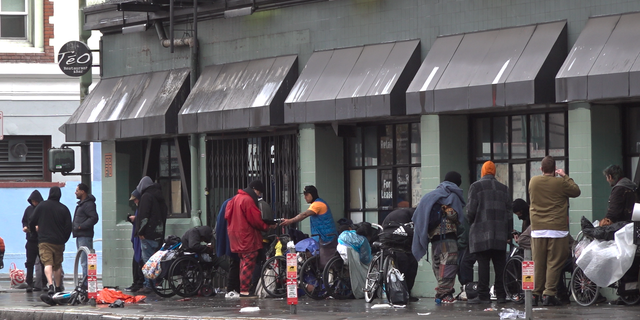 Drug users and drug dealers across the street from the San Francisco Federal Building. 