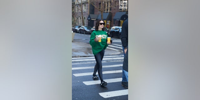Hilaria Baldwin picks up coffee in New York City on January 20, the morning after Alec Baldwin was charged with two counts of involuntary manslaughter.