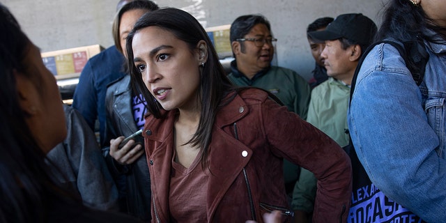 On election morning Congresswoman Alexandria Ocasio-Cortez campaigns for re-election, November 8, 2022 in the Woodside neighborhood of Queens, New York. 