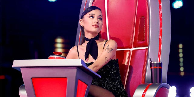 Before filming "Wicked," Ariana Grande joined the cast of the competition singing show, "The Voice" as a coach.