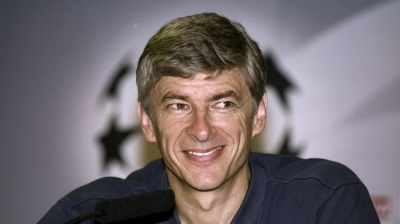 29 Sep 1999:  Arsenal manager Arsene Wenger looks pleased with his teams performance after the Barcelona v Arsenal UEFA Champions League Group B match played at the Nou Camp, Barcelona, Spain. The game finished in a 1-1 draw.   Mandatory Credit: Shaun Botterill /Allsport