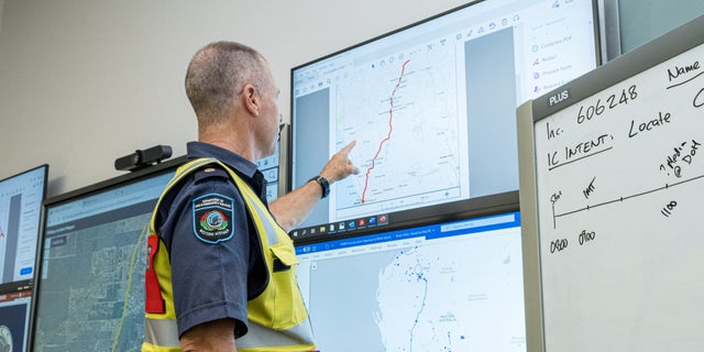 A member of the Incident Management Team coordinates the search for a radioactive capsule that was lost in transit by a contractor hired by Rio Tinto, at the Emergency Services Complex in Cockburn, Australia.