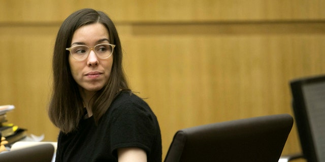 FILE - Jodi Arias looks back at the gallery during the sentencing phase of her trial at Maricopa County Superior Court in Phoenix on Wednesday, Dec. 17, 2014.
