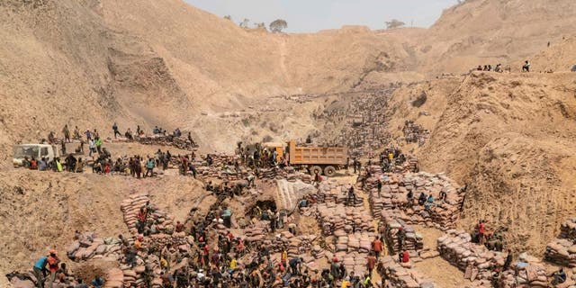 Artisanal miners work at a cobalt mine in the Democratic Republic of the Congo on Oct. 12, 2022.