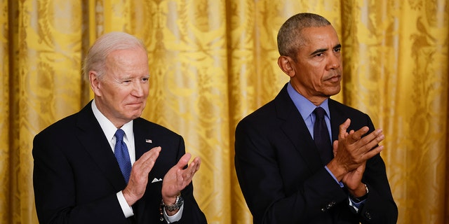 President Joe Biden and former President Barack Obama attend an event to mark the 2010 passage of the Affordable Care Act in the East Room of the White House on April 5, 2022, in Washington, D.C.