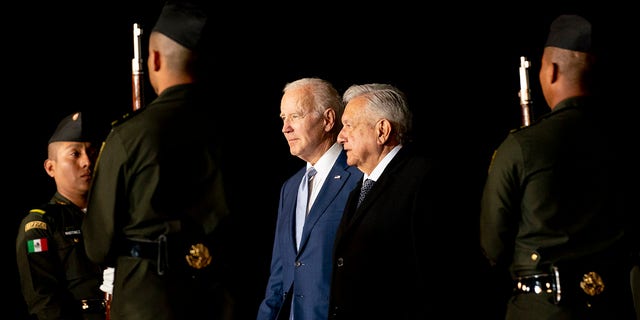 President Joe Biden is greeted by Mexican President Andres Manuel Lopez Obrador as he arrives at the Felipe Angeles international airport in Zumpango, Mexico, Sunday, Jan. 8, 2023. 