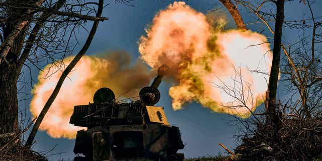 A self-propelled artillery vehicle fires near Bakhmut, Donetsk region, Ukraine, Wednesday, Nov. 9, 2022. 