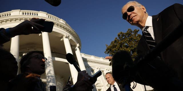 President Biden talks to reporters after returning to the White House on Jan. 30, 2023 in Washington, D.C. Biden had traveled to Baltimore to talk about how the Bipartisan Infrastructure Law's funds are slated to help replace the 150-year-old Baltimore to Potomac Tunnel.  