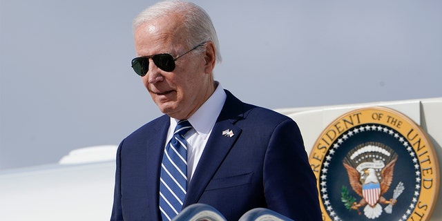 President Biden exits Air Force One as he arrives at Hancock Field Air National Guard Base in Mattydale, N.Y., Thursday, Oct. 27, 2022.