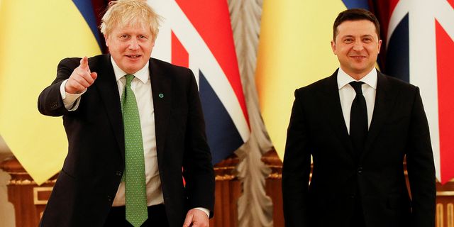 Then-British Prime Minister Boris Johnson meets with Ukrainian President Volodymyr Zelenskyy at the presidential palace in Kyiv on Feb. 1, 2022.