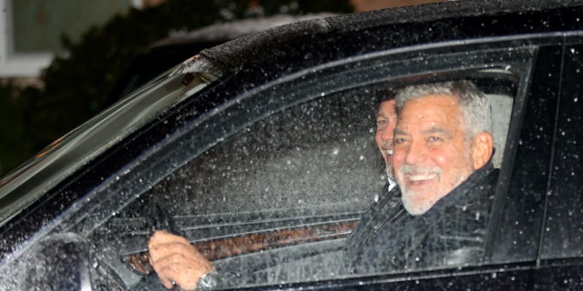 Pitt and Clooney were additionally seen laughing together as they sat in a dark blue vehicle on the set. 