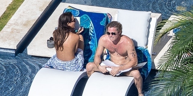 Brad Pitt and new girlfriend Ines De Ramon slip into swimsuits on romantic getaway in Cabo.