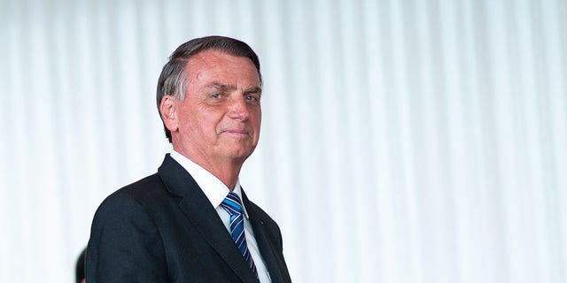 President of Brazil Jair Bolsonaro arrives for a press conference two days after being defeated by Lula da Silva in the presidential runoff at Alvorada Palace on November 1, 2022 in Brasilia, Brazil. Bolsonaro didn't acknowledge his defeat and asked supporters to protest in a pacific way and allowing free transit through the country. 