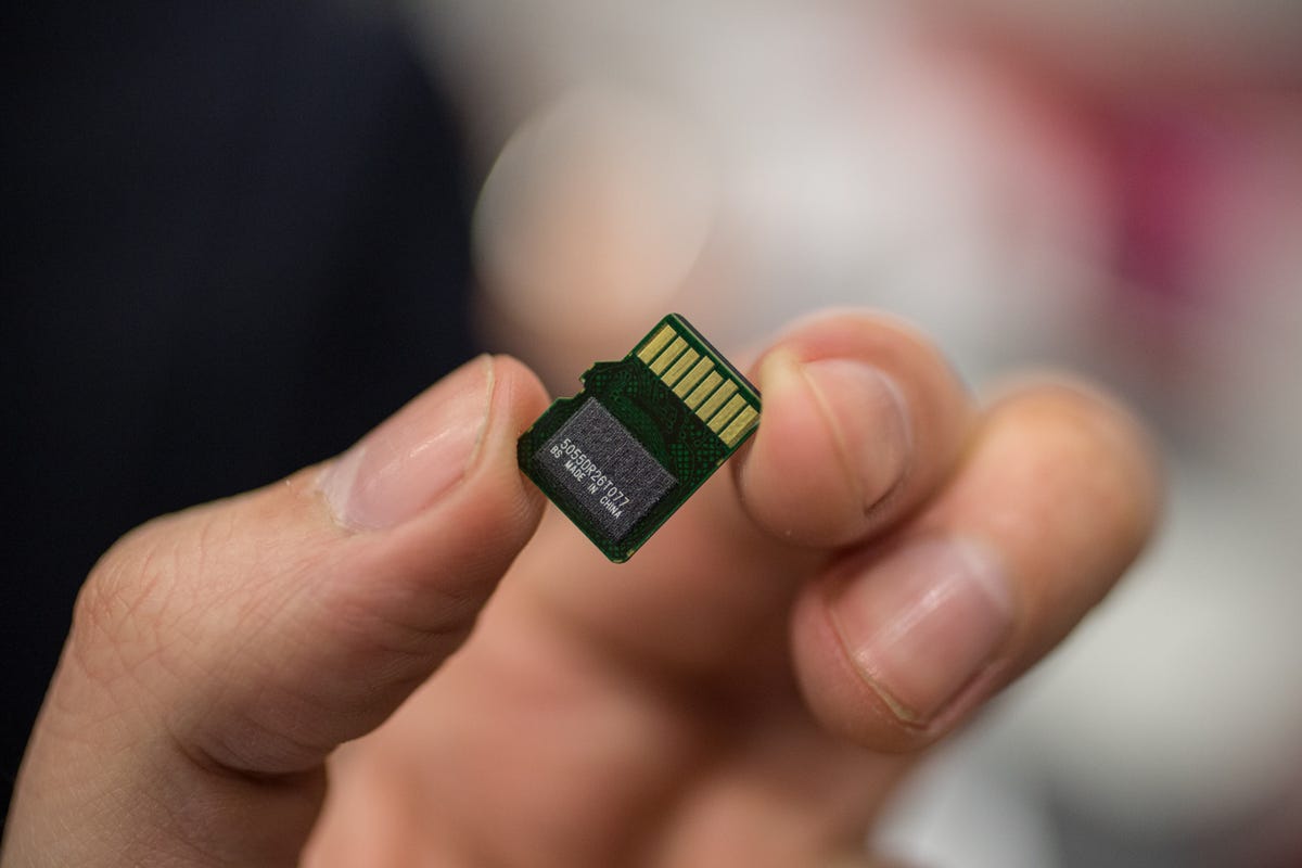 A microSD card in hand