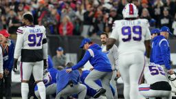 Buffalo Bills' Damar Hamlin is examined during the first half of an NFL football game against the Cincinnati Bengals, Monday, Jan. 2, 2023, in Cincinnati. (AP Photo/Jeff Dean)