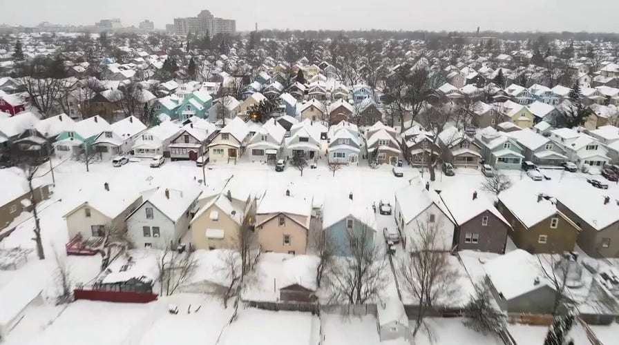 Video shows Buffalo, New York, neighborhoods covered in snow following winter storm.