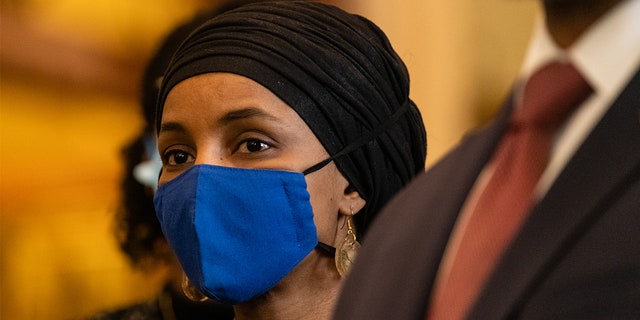 Representative Ilhan Omar, a Democrat from Minnesota, beside members of the Congressional Black Caucus at the Senate side of the U.S. Capitol in Washington, D.C., U.S., on Wednesday, Jan. 19, 2022. 