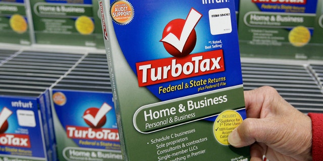 In this Jan. 24, 2013, photo, a customer looks at a copy of TurboTax on sale at Costco in Mountain View, California.