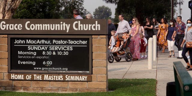 Grace Community Church parishioners make their way to Sunday service in Sun Valley on Sept. 13, 2020. 
