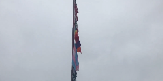 FILE- In June 2020, the district flew flags representing Black Lives Matter, pride, and transgender rights movements.