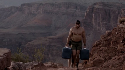 Ryan Hall was one of the world's best marathoners. Today, his workouts -- and physique -- are a little different. He's just completed a unusual challenge involving chopping a cord of wood and carrying two 62-pound water jugs across more than 5,000 feet of elevation up the Grand Canyon.