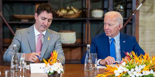 President Joe Biden looks to Canadian Prime Minister Justin Trudeau during a meeting of G7 and NATO leaders in Bali, Indonesia, on Nov. 16, 2022. Canada finalized an agreement to purchase 88 F-35 fighter jets from the United States and Lockheed Martin Corp on Jan. 9, 2023.