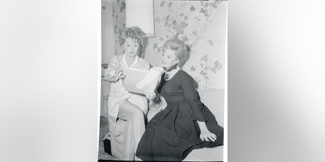 Lucille Ball (left) and Carole Cook review a script