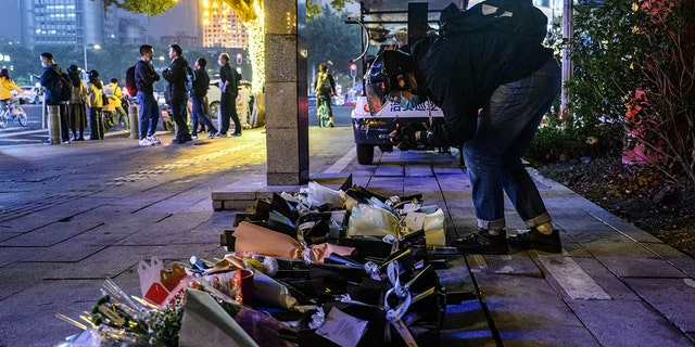 FILE: Bunches of flowers, which citizens sent to mourn the victims, are seen on January 12, 2023, in Guangzhou, China. 