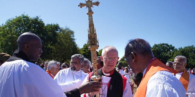 Archbishop of Canterbury Justin Welby (center right) with bishops from around the world gather at University of Kent in Canterbury for a group photo during the 15th Lambeth Conference on July 29, 2022.