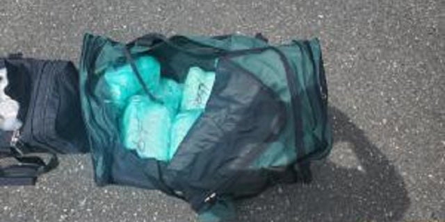 U.S. Customs and Border Protection agents seized more than two dozen duffels bags containing methamphetamine on a boat near the U.S.-Canadian border. 