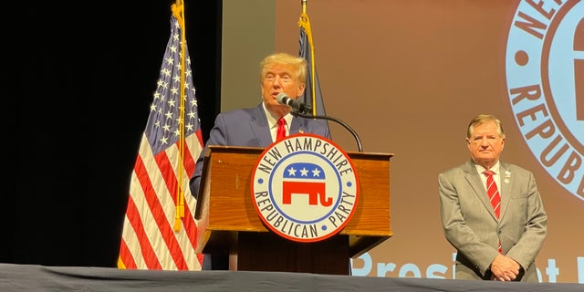 Former President Donald Trump gives the headline address at the GOP annual meeting in Salem, New Hampshire, on Jan. 28, 2023.