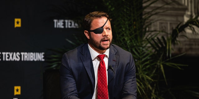 Representative Dan Crenshaw, a Republican from Houston, speaks in Austin, Texas, US, on Friday, Sept. 23, 2022. 