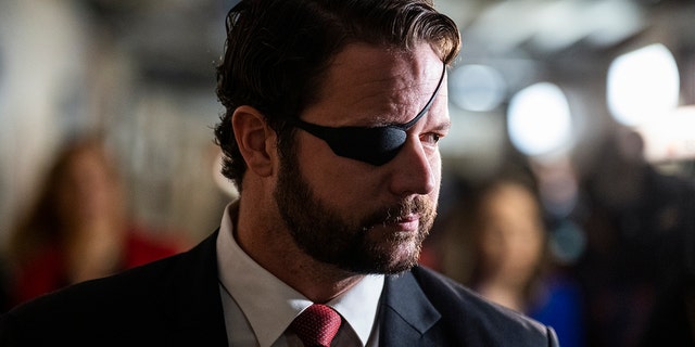 Rep. Dan Crenshaw, R-Texas, is seen outside a meeting of the House Republican Conference in the U.S. Capitol on Tuesday, January 3, 2023. 