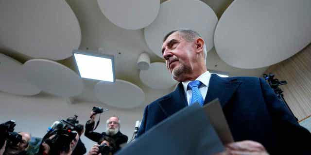 Presidential candidate Andrej Babis arrives to cast his vote at a polling station in Pruhonice, Czech Republic, on Jan. 13, 2023. 
