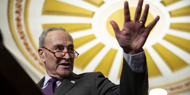 Senate Majority Leader Chuck Schumer is one of many Democrats warning of economic ruin because of the GOP push to negotiate spending cuts as part of a debt ceiling increase. (Al Drago/Bloomberg via Getty Images)