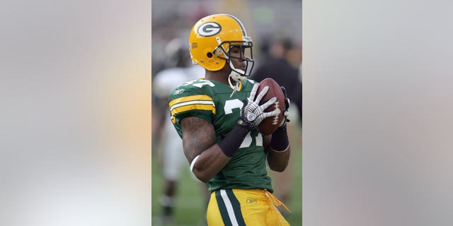 Aaron Rouse, #37 of the Green Bay Packers, carries the ball before the game against the Jacksonville Jaguars on Aug. 23, 2007, at Lambeau Field in Green Bay, Wisconsin. 