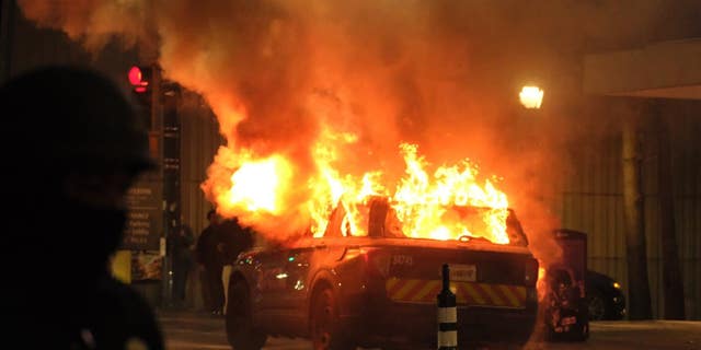 Burning Atlanta Police Department SUV.