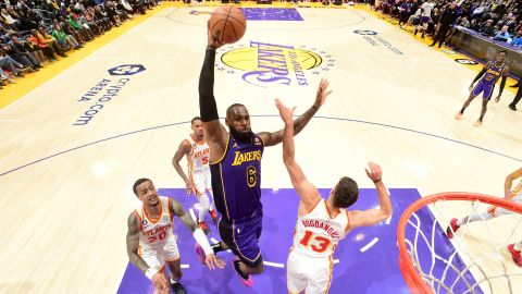 LeBron James drives to the basket against the Hawks. 