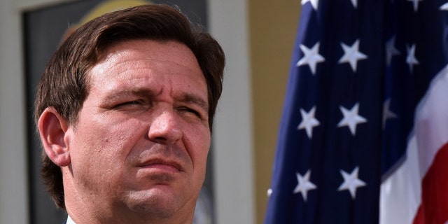 FILE: Florida Gov. Ron DeSantis seen during a press conference to announce the award of $100 million for beach recovery following Hurricanes Ian and Nicole in Daytona Beach Shores in Florida. 