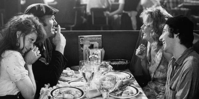 From left: Ann Wedgeworth, Gene Hackman, Dorothy Tristan and Al Pacino eat dinner in a scene from the 1973 film "Scarecrow."