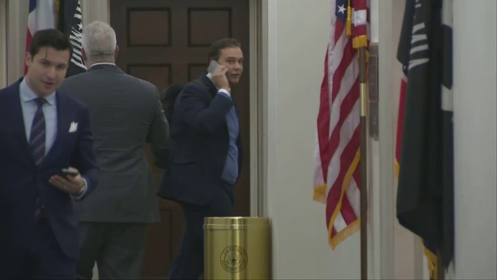 Rep.-elect George Santos avoided reporters as he arrived at his Capitol Hill office.