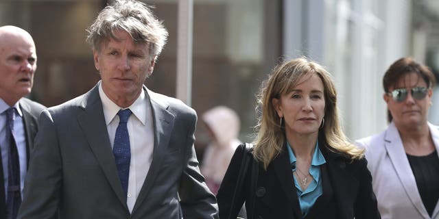 Felicity Huffman arrives at federal court in Boston on April 3, 2019.