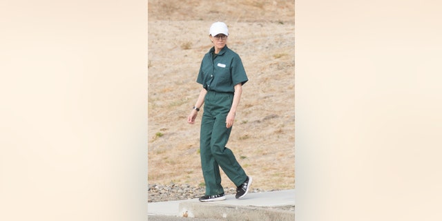 Felicity Huffman seen wearing a prison jumpsuit while serving her sentence on federal charges in 2019.