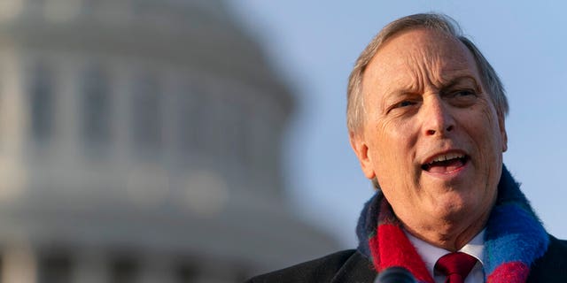In this Dec. 3, 2020 file photo Freedom Caucus chairman Rep. Andy Biggs, R-Ariz., speaks on Capitol Hill in Washington.