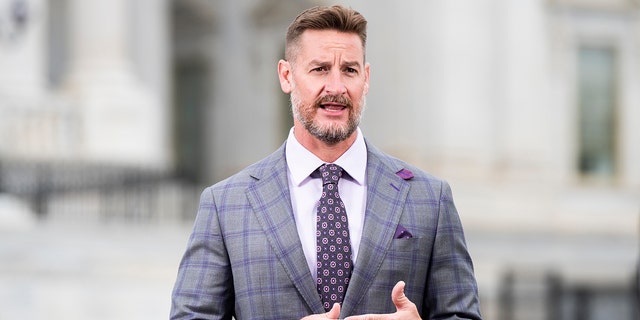 Rep. Greg Steube, R-Fla., does a TV stand up outside of the U.S. Capitol before the House vote on the $483.4 billion economic relief package on April 23, 2020.