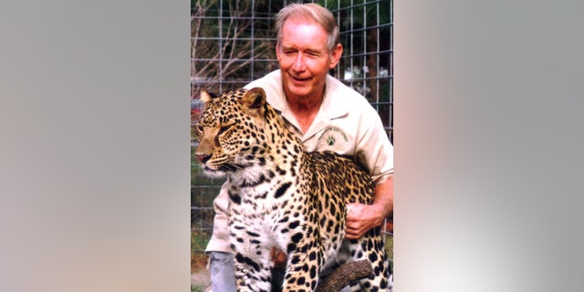 Don Lewis, big cat rescuer Carole Baskin's second husband, pictured with a leopard.