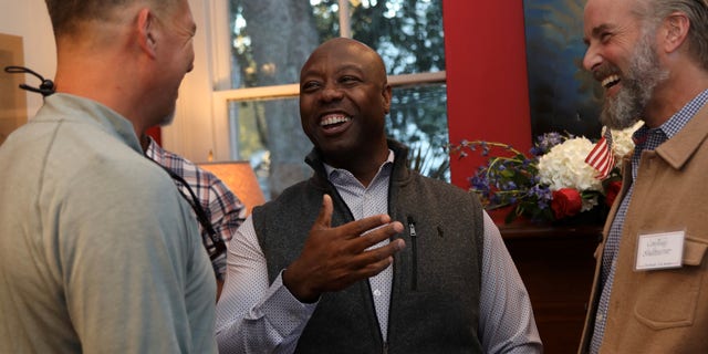 Sen. Tim Scott of South Carolina meets voters in Summerville, South Carolina during his re-election campaign in 2021.