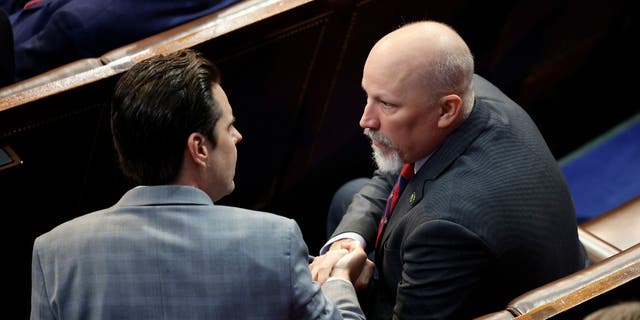 Congressman-elect Matt Gaetz, R-Fla., speaks with Congressman-elect Chip Roy, R-Texas, in the House chamber during the fourth day of elections for speaker of the House.