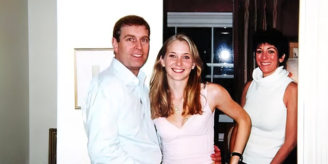 Photo from 2001 that was included in court files shows Prince Andrew with his arm around the waist of 17-year-old Virginia Giuffre who says Jeffrey Epstein paid her to have sex with the prince. Andrew has denied the charges. In the background is Epstein's girlfriend Ghislaine Maxwell. 
