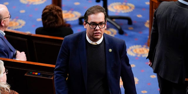 Rep.-elect George Santos, R-N.Y., walks in the House chamber as the House meets for the third day to elect a speaker and convene the 118th Congress in Washington, Thursday, Jan. 5, 2023. 